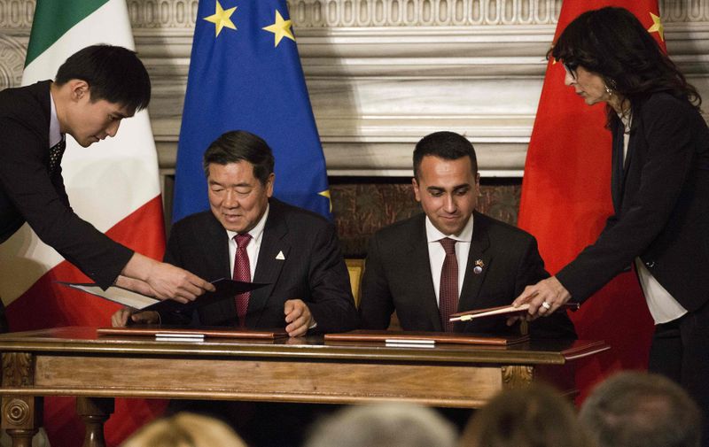 March 23, 2019 - Rome, Italy - Italy, Rome: Chairman of China's National Development and Reform Commission (NDRC), He Lifeng (L) and Italys Labor and Industry Minister and deputy PM Luigi Di Maio sign partnership agreements during a ceremony at Villa Madama in Rome on March 23, 2019 as part of China's president two-day visit to Italy.  President Xi Jinping is in Italy to sign a memorandum of understanding to make Italy the first Group of Seven leading democracies to join China's ambitious Belt and Road infrastructure project., Image: 421686115, License: Rights-managed, Restrictions: * France Rights OUT *, Model Release: no, Credit line: Profimedia, Zuma Press - News