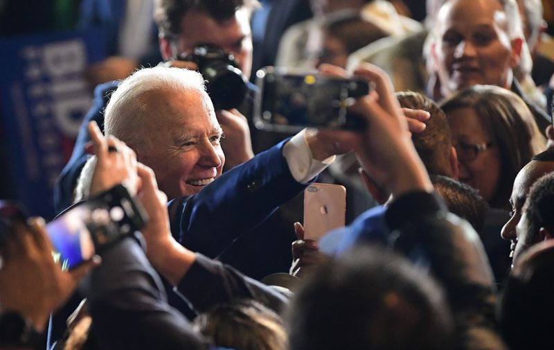 Democratic presidential hopeful former Vice President Joe Biden greets supporters after addressing a Super Tuesday event in Los Angeles on March 3, 2020. (Photo by FREDERIC J. BROWN / AFP)