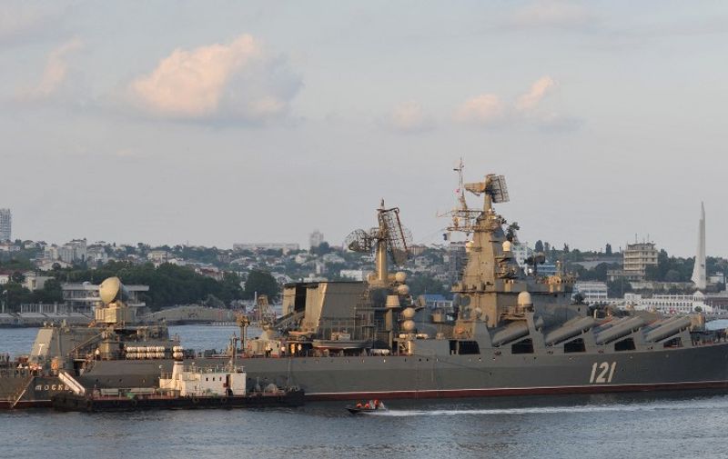 (FILES) This file photo taken on July 31, 2011 shows the Moskva guided missile cruiser participating in a Russian military Navy Day parade near a navy base in Sevastopol. - The Moskva, a Russian warship in the Black Sea, was "seriously damaged" by an ammunition explosion, Russian state media said on April 14, 2022. (Photo by AFP)