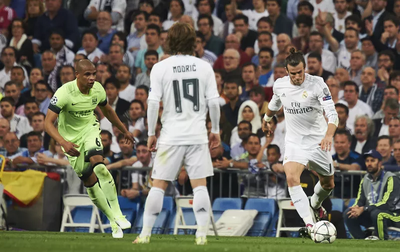 Gareth Bale (midfielder; Real Madrid), Luka Modric (midfielder; Real Madrid) in action during the UEFA Champions League match between Real Madrid and Manchester City FC  at Santiago Bernabeu on May 4, 2016 in Madrid