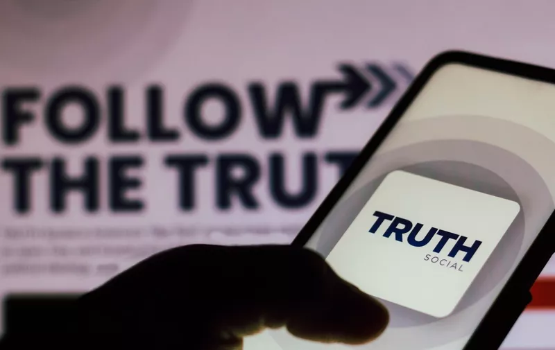 In this photo illustration, the Truth Social logo seen displayed on a smartphone. 
The social media app will be developed by Trump Media and Technology Group (TMTG).,Image: 639162018, License: Rights-managed, Restrictions: *** World Rights ***, ***
HANDOUT image or SOCIAL MEDIA IMAGE or FILMSTILL for EDITORIAL USE ONLY! * Please note: Fees charged by Profimedia are for the Profimedia's services only, and do not, nor are they intended to, convey to the user any ownership of Copyright or License in the material. Profimedia does not claim any ownership including but not limited to Copyright or License in the attached material. By publishing this material you (the user) expressly agree to indemnify and to hold Profimedia and its directors, shareholders and employees harmless from any loss, claims, damages, demands, expenses (including legal fees), or any causes of action or allegation against Profimedia arising out of or connected in any way with publication of the material. Profimedia does not claim any copyright or license in the attached materials. Any downloading fees charged by Profimedia are for Profimedia's services only. * Handling Fee Only 
***, Model Release: no