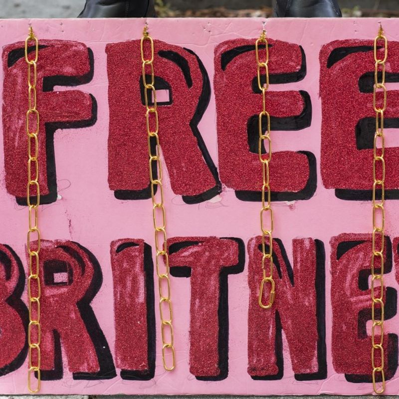 A placard is pictured in front of the courthouse during the FreeBritney movement rally in support of musician Britney Spears following a conservatorship court hearing in Los Angeles, California on April 27, 2021. - Britney Spears has requested to speak in court in the legal battle over her father's control of her affairs, her attorney said April 27, 2021. The 39-year-old US pop singer is the subject of a "FreeBritney" online campaign from her adoring fans who believe the guardianship in place since 2008 should be ended, but has rarely spoken directly about the issue herself. (Photo by VALERIE MACON / AFP)