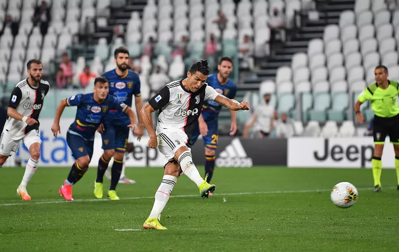 TURIN, ITALY - JUNE 26:  Cristiano Ronaldo of Juventus scores his goal from the penalty spot during the Serie A match between Juventus and  US Lecce at Allianz Stadium on June 26, 2020 in Turin, Italy.  (Photo by Valerio Pennicino/Getty Images)