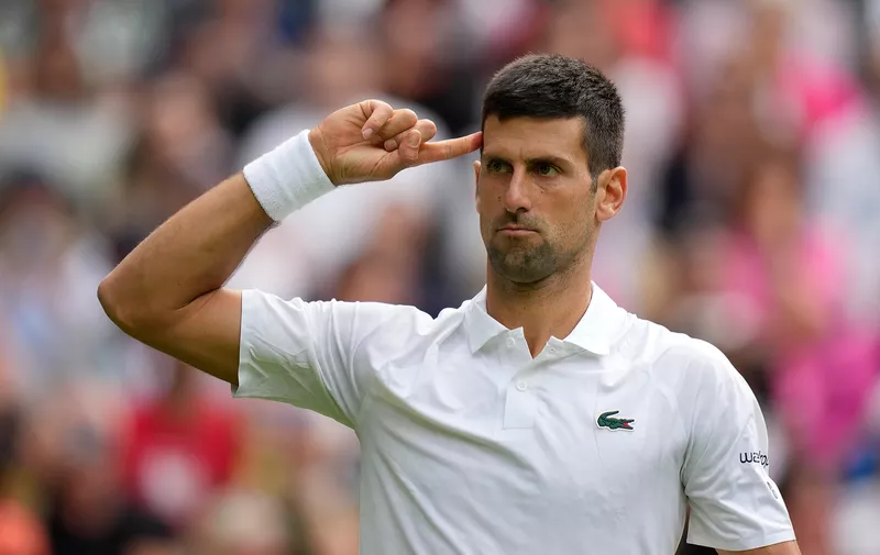 Serbia's Novak Djokovic after winning the second set from Australia's Jordan Thompson during the men's singles match on day three of the Wimbledon tennis championships in London, Wednesday, July 5, 2023. (AP Photo/Alastair Grant)
