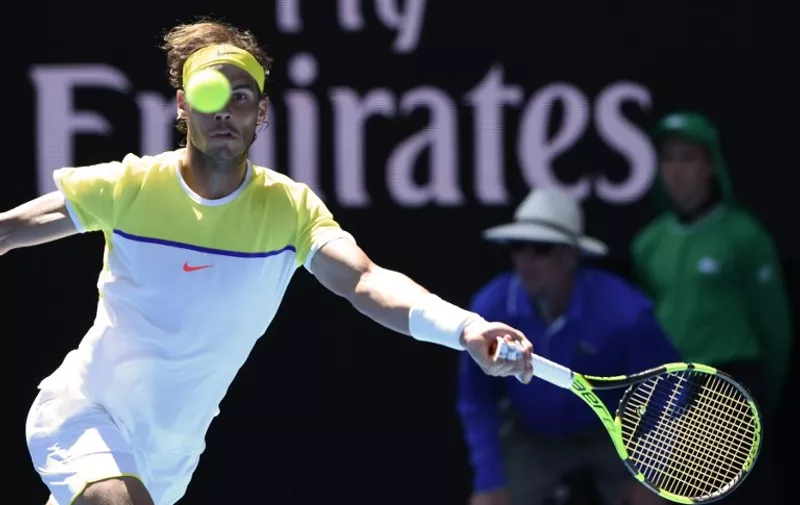 Spain's Rafael Nadal plays a forehand return during his men's singles match against compatriot Fernando Verdasco on day two of the 2016 Australian Open tennis tournament in Melbourne on January 19, 2016. AFP PHOTO / WILLIAM WEST-- IMAGE RESTRICTED TO EDITORIAL USE - STRICTLY NO COMMERCIAL USE / AFP / WILLIAM WEST
