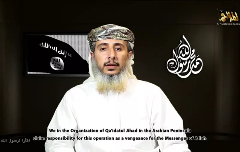 (FILES) - A file image grab taken off a propaganda video posted online on January 14, 2015, by Al-Malahem Media, the media arm of Al-Qaeda in the Arabian Peninsula (AQAP), purportedly shows one of the group's leaders, Nasser bin Ali al-Ansi delivering a video message from an undisclosed location and claiming responsibility for the attack on the French satirical magazine Charlie Hebdo's offices in Paris. A US air strike in Yemen last month killed the senior Al-Qaeda official who appeared in the video claiming the deadly January attack on Charlie Hebdo, SITE Intelligence Group said on May 7, 2015. AFP PHOTO / HO / AL-MALAHEM MEDIA
=== RESTRICTED TO EDITORIAL USE - MANDATORY CREDIT "AFP PHOTO / HO / AL-MALAHEM MEDIA" - NO MARKETING NO ADVERTISING CAMPAIGNS - DISTRIBUTED AS A SERVICE TO CLIENTS FROM ALTERNATIVE SOURCES, AFP IS NOT RESPONSIBLE FOR ANY DIGITAL ALTERATIONS TO THE PICTURE'S EDITORIAL CONTENT, DATE AND LOCATION WHICH CANNOT BE INDEPENDENTLY VERIFIED ===
