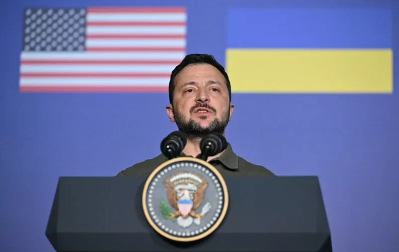 Ukrainian President Volodymyr Zelensky speaks after signing a bilateral security agreement with US President Joe Biden during a press conference at the Masseria San Domenico on the sidelines of the G7 Summit hosted by Italy in Apulia region, on June 13, 2024 in Savelletri. Leaders of the G7 wealthy nations gather in southern Italy this week against the backdrop of global and political turmoil, with boosting support for Ukraine top of the agenda. (Photo by Mandel NGAN / AFP)
