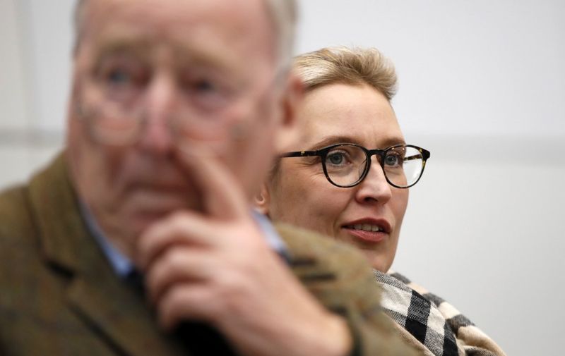 Co-leader of the Alternative for Germany (AfD) far-right party Alexander Gauland (L) and AfD parliamentary group co-leader Alice Weidel arrive for a parliamentary group meeting on January 15, 2018 in Berlin. - Germany's domestic intelligence will step up monitoring for political extremism of the AfD, sources said, a blow to the party in a busy election year. However, the agency has shied away from immediate full surveillance of the entire party, including phone and email taps, the use of undercover informants and the collection of personal data on MPs. (Photo by Odd ANDERSEN / AFP)