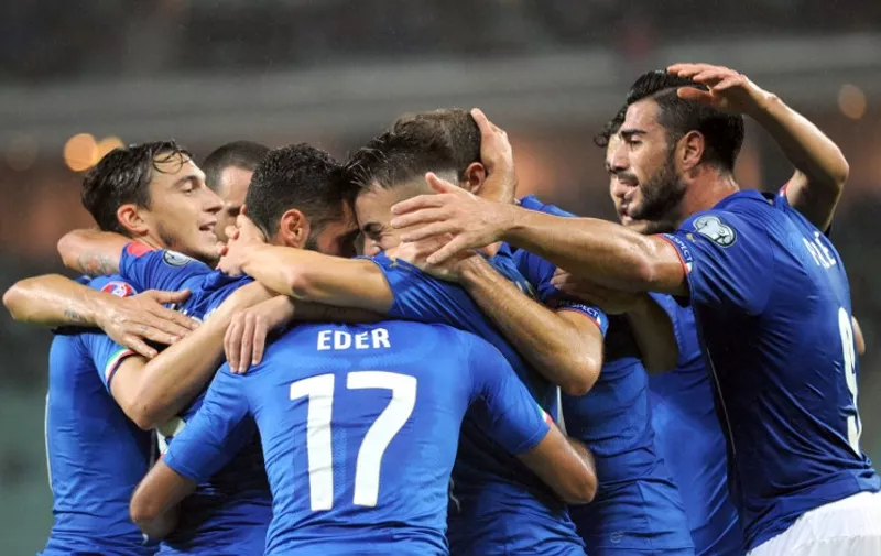 Italy's players celebrate after scoring a goal during the Euro 2016 group H qualifying football match between Azerbaijan and Italy on October 10, 2015, in Baku. AFP PHOTO / VANO SHLAMOV