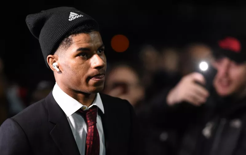 Manchester United's English striker Marcus Rashford arrives for the English Premier League football match between Burnley and Manchester United at Turf Moor in Burnley, north west England on December 28, 2019. (Photo by Oli SCARFF / AFP) / RESTRICTED TO EDITORIAL USE. No use with unauthorized audio, video, data, fixture lists, club/league logos or 'live' services. Online in-match use limited to 120 images. An additional 40 images may be used in extra time. No video emulation. Social media in-match use limited to 120 images. An additional 40 images may be used in extra time. No use in betting publications, games or single club/league/player publications. /