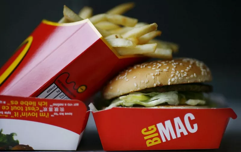A Big Mac hamburger and french fries are pictured in a McDonalds fast food store in Central London on August 6, 2008. McDonald's launched a campaign on August 6 to recruit 4,000 staff in Britain to satisfy the demand from cash-strapped customers flocking to its restaurants as the credit crunch bites hard. As the rest of the British economy hits turbulent times, the fast food giant said it was serving an extra two million meals a month compared with this time last year. AFP PHOTO/Ben Stansall (Photo by BEN STANSALL / AFP)