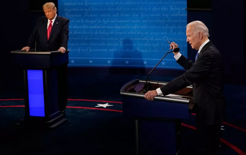 Democratic Presidential candidate and former US Vice President Joe Biden (R) and US President Donald Trump participate in the final presidential debate at Belmont University in Nashville, Tennessee, on October 22, 2020. (Photo by Morry GASH / POOL / AFP)