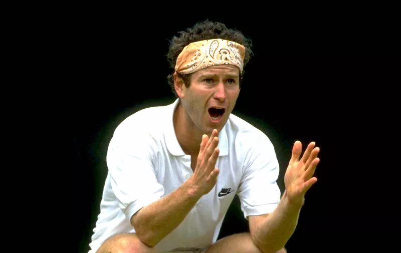 30 JUN 1991:  JOHN MCENROE OF THE UNITED STATES ARGUES WITH THE UMPIRE OVER A CALL OF OUT DURING THE 1991 WIMBLEDON CHAMPIONSHIPS.