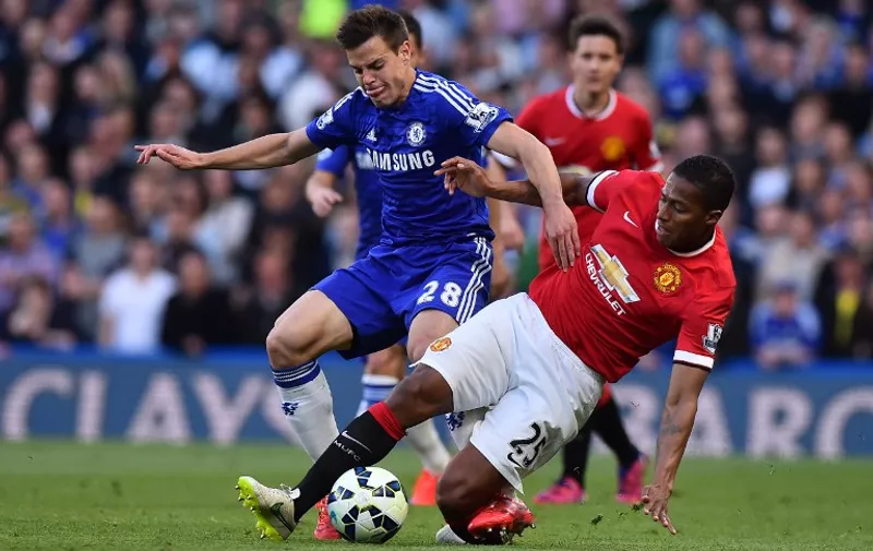Manchester United&#8217;s Ecuadorian midfielder Antonio Valencia (R) challenges Chelsea&#8217;s Spanish defender Cesar (L) during the English Premier League football match between Chelsea and Manchester United at Stamford Bridge in London on April 18, 2015. AFP PHOTO / RESTRICTED TO EDITORIAL USE. No use with unauthorized audio, video, data, fixture lists, club/league logos or live services. [&hellip;]