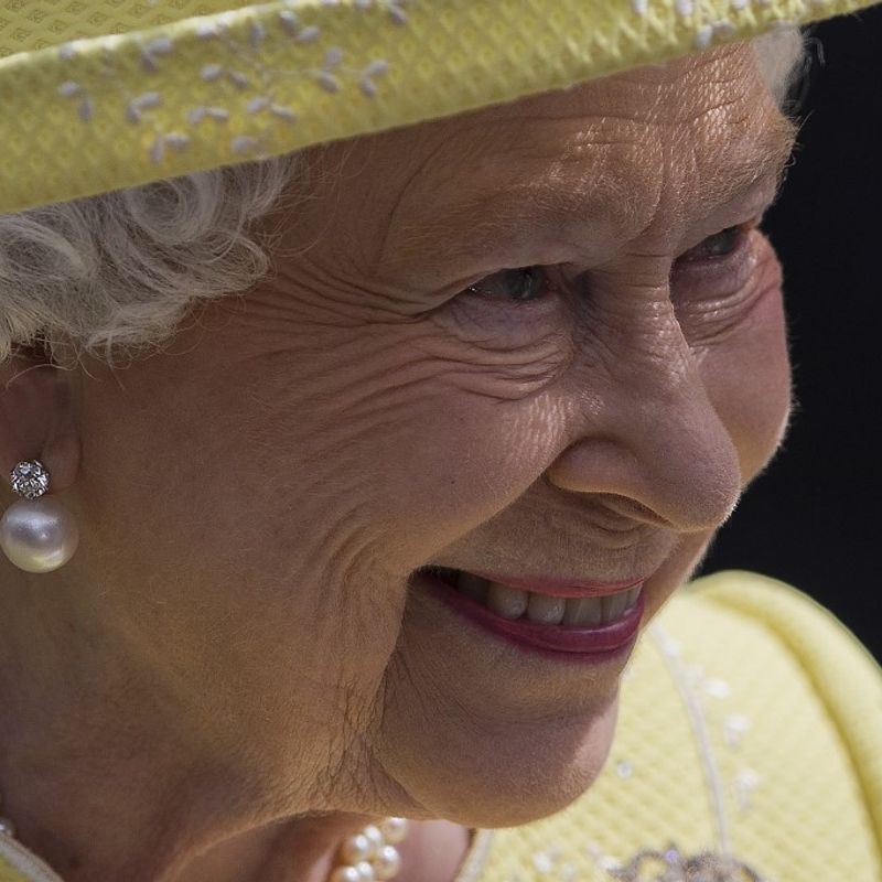 (FILES) In this file photo taken on June 10, 2016 Britain's Queen Elizabeth II smiles as she leaves, after attending a national service of thanksgiving for her 90th birthday at St Paul's Cathedral in London, which is also the Duke of Edinburgh's 95th birthday. - Gun salutes will ring out Thursday to mark Queen Elizabeth II's 96th birthday, although the monarch herself was expected to mark the occasion with little fanfare. (Photo by JUSTIN TALLIS / AFP)