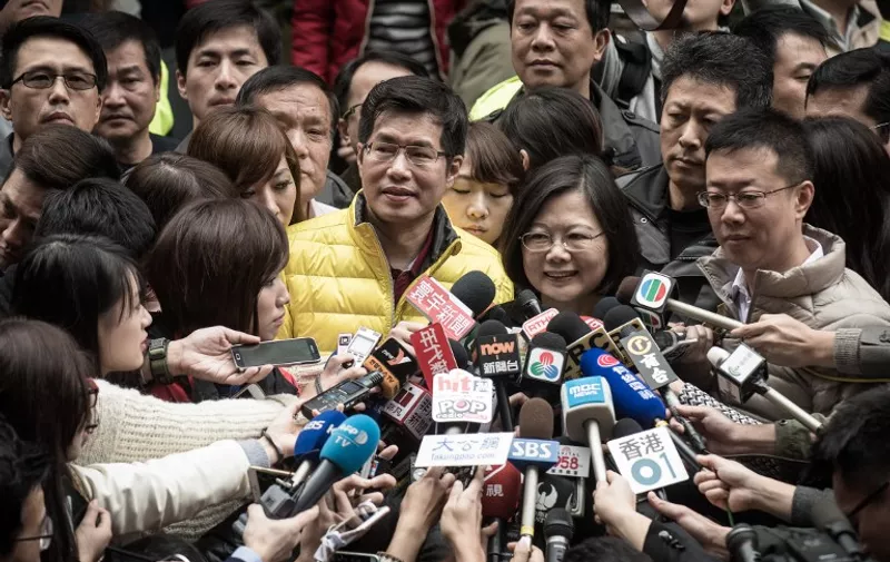 Democratic Progressive Party (DPP) presidential candidate Tsai Ing-wen talks to the media after she voted in New Taipei City on January 16, 2016. Polls opened in Taiwan with the island expected to elect its first female president in a historic vote likely to end eight years of closer China ties. AFP PHOTO / Philippe Lopez / AFP / PHILIPPE LOPEZ