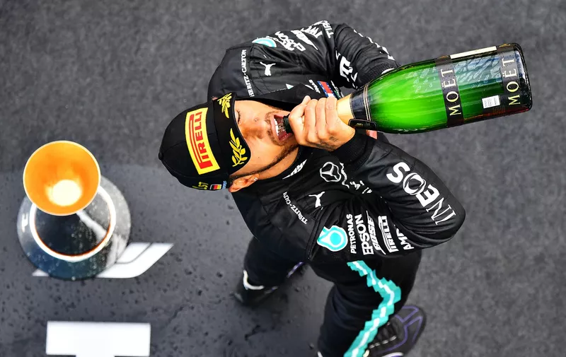NUERBURG, GERMANY - OCTOBER 11: Race winner Lewis Hamilton of Great Britain and Mercedes GP celebrates on the podium during the F1 Eifel Grand Prix at Nuerburgring on October 11, 2020 in Nuerburg, Germany. (Photo by Getty Images/Getty Images)