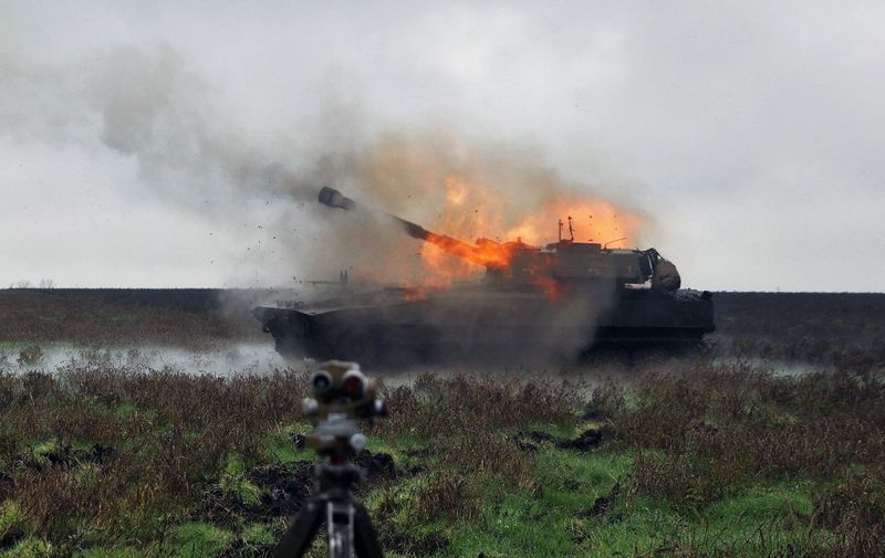 A Ukrainian army 2S1 Gvozdika self-propelled howitzer fires a shell on the front line in Donetsk region on October 10, 2022 as Russian forces launched earlier today at least 75 missiles at Ukraine, with fatal strikes targeting the capital Kyiv, and cities in the south and west. (Photo by Anatolii STEPANOV / AFP)