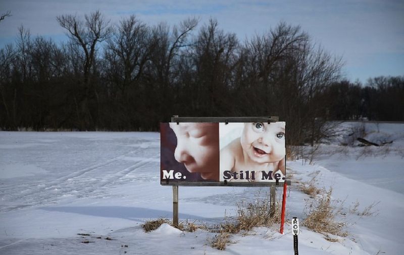 FENTON, IA - JANUARY 29: A pro-life sign is posted in a field on January 29, 2016 in Fenton, Iowa. Candidates who are seeking the nominations from the Republican and Democratic Party are touring the state campaigning for votes before the Iowa caucus that takes place on February 1.   Joe Raedle/Getty Images/AFP