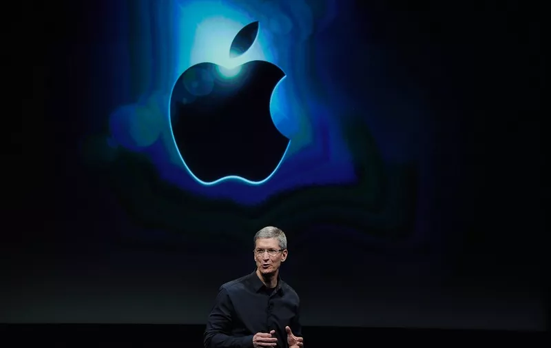 (FILES): This October 4, 2011 photograph shows Apple CEO Tim Cook during an event introducing the new iPhone 4s at the company's headquarters in Cupertino, California.  The death on Wednesday, October 5, 2011 of Apple founder Steve Jobs will likely raise new concerns about whether the California-based company can survive without his vision and flair for invention. The spotlight will be on freshly-anointed Apple chief Tim Cook who immediately paid tribute to the 56-year-old Jobs calling him an "inspiring mentor."      Kevork Djansezian/Getty Images/AFP (Photo by KEVORK DJANSEZIAN / GETTY IMAGES NORTH AMERICA / AFP)