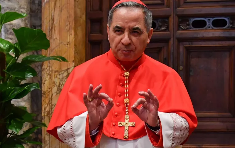 (FILES) In this file photo taken on June 28, 2018 Newly elevated cardinal, Giovanni Angelo Becciu from Italy, attends the courtesy visit of relatives following a consistory for the creation of new cardinals on June 28, 2018 in the Apostolic Palace at St Peter's basilica in Vatican. - Cardinal Angelo Becciu, the head of the vatican's saint-making office, resigned, the Vatican said in a statement on September 24, 2020. Becciu was reportedly indirectly implicated in a financial scandal involving the Vaticans investment in a London real estate deal. (Photo by ANDREAS SOLARO / AFP)