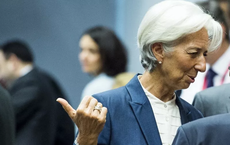 Managing Director of the International Monetary Fund (IMF) Christine Lagarde gestures as she attends a meeting of the Eurogroup finance ministers in Brussels on July 12, 2015. The EU cancelled a full 28-nation summit on July 12 to decide Greece's fate in the single European currency, although a meeting of leaders from the 19 countries in the eurozone will go ahead as planned.  AFP PHOTO / JOHN MACDOUGALL