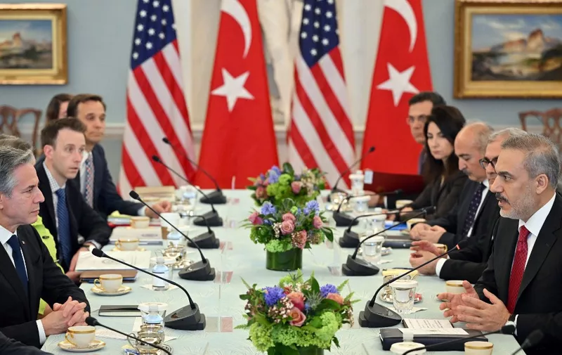 US Secretary of State Antony Blinken (L) takes part in a meeting with Turkeys Foreign Minister Hakan Fidan (R) in the Thomas Jefferson Room of the State Department in Washington, DC, on March 8, 2024. (Photo by Mandel NGAN / AFP)