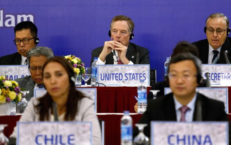 US Trade Representative Robert Lighthizer (C top) attends a press conference during the Asia-Pacific Economic Cooperation (APEC) 23rd Ministers responsible for Trade Meeting in Hanoi on May 21, 2017. / AFP PHOTO / POOL / KHAM
