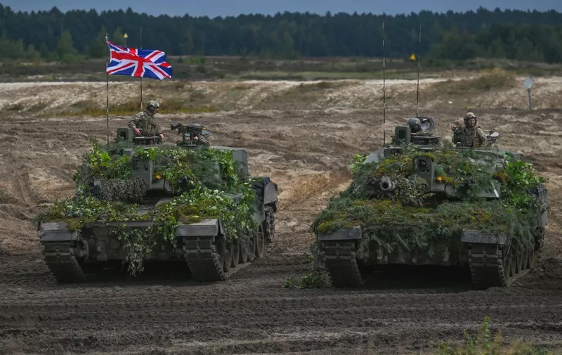 British Army Challenger 2 tanks are seen at the training ground in Nowa Deba on September 21, 2022, in Nowa Deba, Subcarpathian Voivodeship, Poland.
Soldiers from Poland, the USA and Great Britain take part in the joint military exercise 'BEAR 22' (Polish: Niedzwiedz 22') in the Eastern Poland. (Photo by Artur Widak/NurPhoto) (Photo by Artur Widak / NurPhoto / NurPhoto via AFP)
