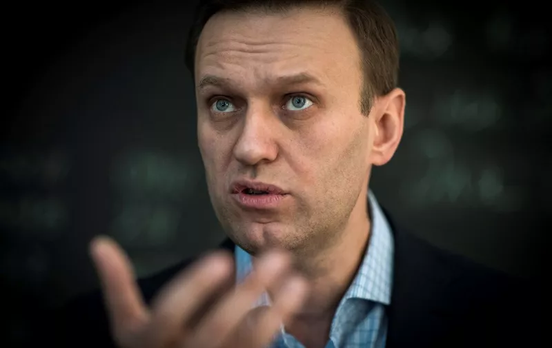 (FILES) In this file photo taken on January 16, 2018 Russian opposition leader Alexei Navalny speaks during an interview with AFP at the office of his Anti-corruption Foundation (FBK) in Moscow. - The Russian opposition leader Alexei Navalny was in intensive care in a Siberian hospital on August 20, 2020 after he fell ill in what his spokeswoman said was a suspected poisoning. (Photo by Mladen ANTONOV / AFP)