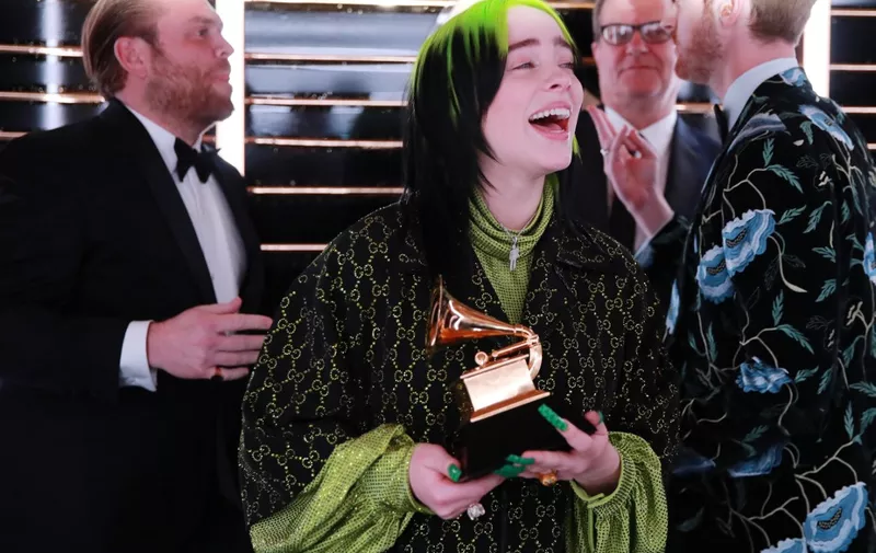 LOS ANGELES, CALIFORNIA - JANUARY 26: Record of the Year award winner Billie Eilish celebrates during the 62nd Annual GRAMMY Awards at STAPLES Center on January 26, 2020 in Los Angeles, California.   Rich Fury/Getty Images for The Recording Academy/AFP