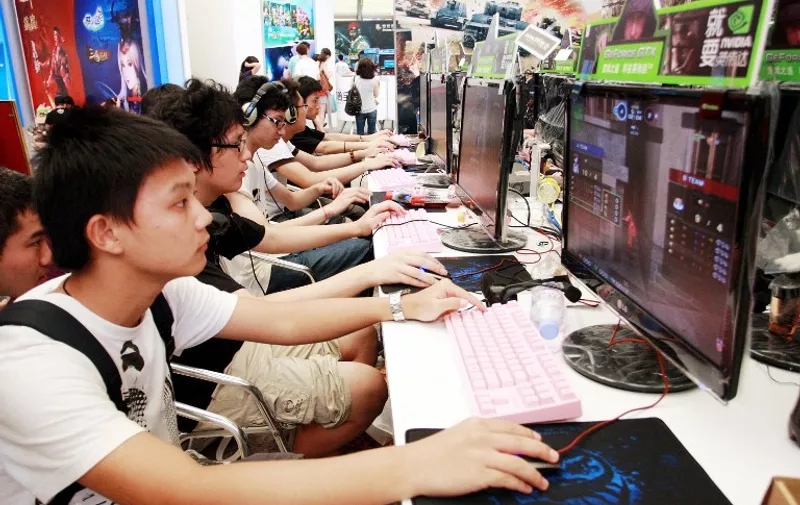 --FILE--Visitors play online games during the 9th China Digital Entertainment Expo, also known as ChinaJoy 2011, in Shanghai, China, 28 July 2011.

Chinas electronic games revenue jumped 34 percent in 2011, thanks to a thriving computer games industry and more smart phone users, the industry regulator said. Last year electronic games generated 44.6 billion yuan (US$7.30 billion) in revenue, up 34 percent from 2010. PC games accounted for 96 percent of the total as the country has more than 120 million PC players. Mobile games earned 1.7 billion yuan last year, a spike of 86 percent over 2010, thanks to an expansion of online games, smart phones, iPads and other mobile devices.