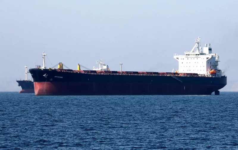 (FILES) In this file photo taken on April 30, 2019, an oil tanker is pictured off the Iranian port city of Bandar Abbas, which is the main base of the Islamic republic's navy and has a strategic position on the Strait of Hormuzon. - Iran's Revolutionary Guards said Thursday they had detained a "foreign tanker" and its crew for allegedly smuggling fuel, in the latest incident to send tensions soaring in the Gulf. (Photo by ATTA KENARE / AFP)