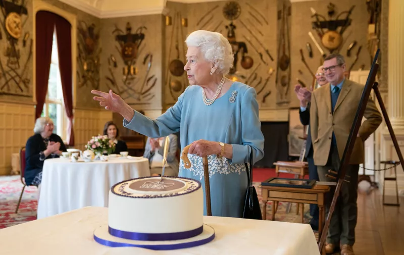 Queen Elizabeth II cuts a cake to celebrate the start of the Platinum Jubilee during a reception in the Ballroom of Sandringham House, which is the Queen's Norfolk residence.  The Queen came to the throne 70 years ago this Sunday when, on February 6 1952, the ailing King George VI - who had lung cancer - died at Sandringham in the early hours. 
Queen Elizabeth II at Sandringham House, Norfolk, UK - 05 Feb 2022,Image: 659608116, License: Rights-managed, Restrictions: , Model Release: no, Credit line: Profimedia
