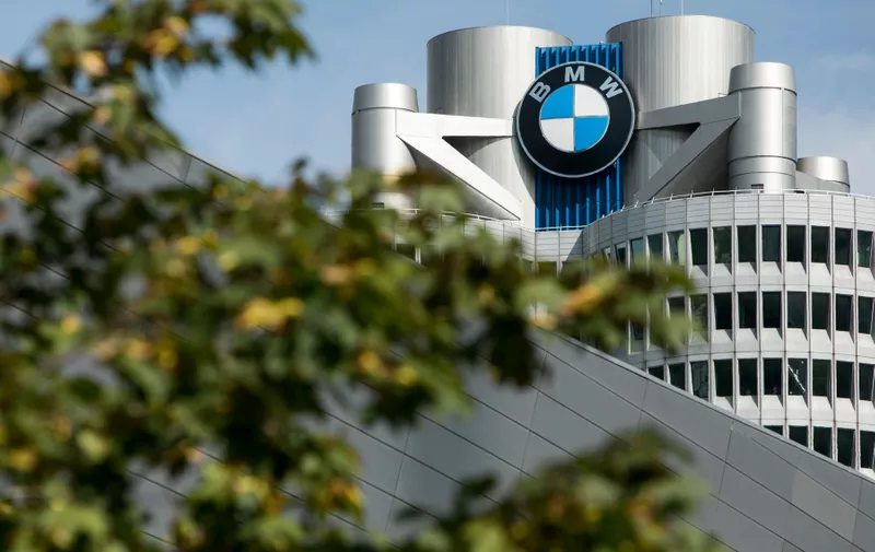 A logo sign outside of the headquarters of the BMW Group (Bayerische Motoren Werke) in Munich, Germany, on September 9, 2018.,Image: 387976411, License: Rights-managed, Restrictions: , Model Release: no