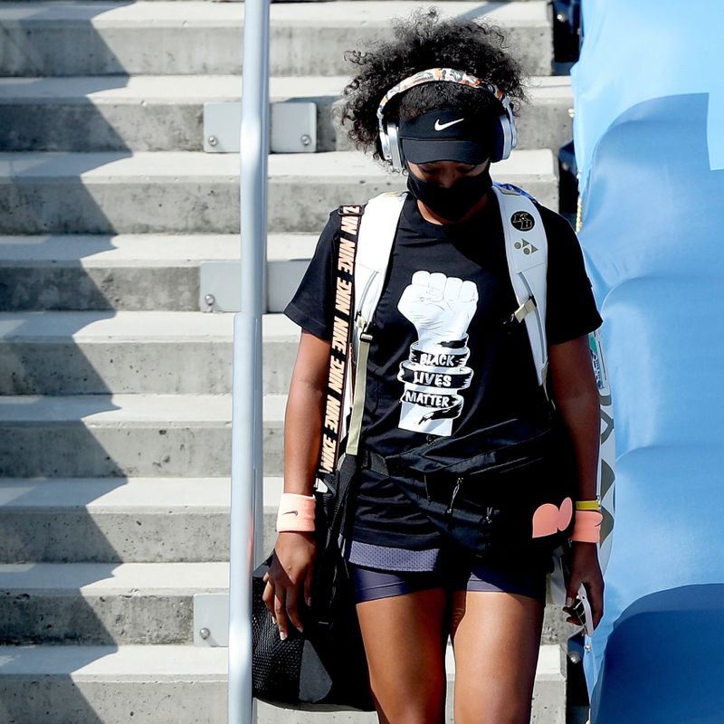 NEW YORK, NEW YORK - AUGUST 28:  Naomi Osaka of Japan makes her way to the court for her semifinal match against Elise Mertens of Belgium during the Western &amp; Southern Open at the USTA Billie Jean King National Tennis Center on August 28, 2020 in the Queens borough of New York City. (Photo by Matthew Stockman/Getty Images)