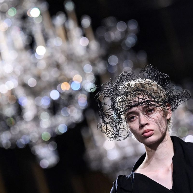 A model presents a creation from Yohji Yamamoto Womenswear Fall-Winter 2023-2024 collection during Paris Fashion Week in Paris, on March 3, 2023. (Photo by Emmanuel DUNAND / AFP)
