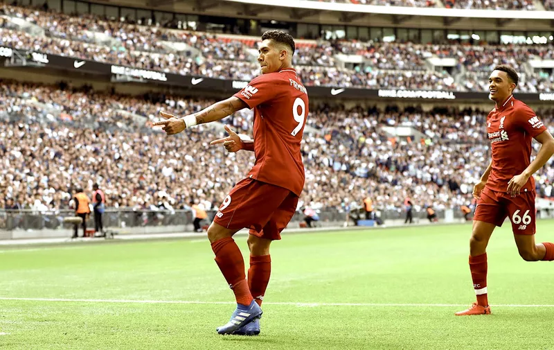 single club/league/player publications/services. Roberto Firmino of Liverpool celebrates scoring a goal to make the score 0-2 Tottenham Hotspur v Liverpool, Premier League, Football, Wembley Stadium, London, UK &#8211; 15 Sep 2018, Image: 386850722, License: Rights-managed, Restrictions: EDITORIAL USE ONLY No use with unauthorised audio, video, data, fixture lists (outside the EU), club/league logos or &#8220;live&#8221; [&hellip;]