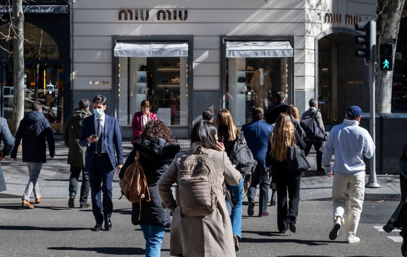 Pedestrians cross the street in front of the Italian high fashion women's clothing and accessory brand Miu Miu store in Spain.
Brand and logos in Spain,Image: 684719370, License: Rights-managed, Restrictions: , Model Release: no, Credit line: Profimedia