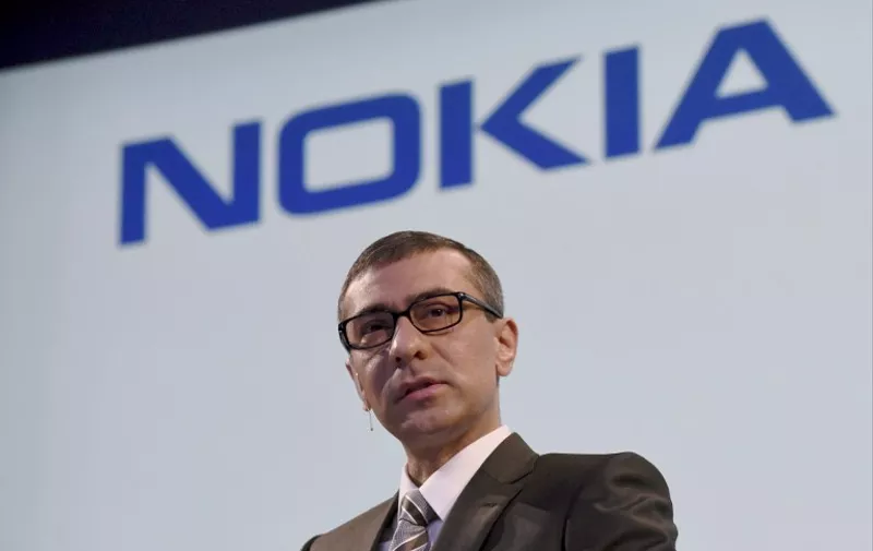 Nokia's Chief Executive Rajeev Suri addresses a press conference at the Nokia head offices in Espoo, Finland, on April 17, 2015.    AFP PHOTO / LEHTIKUVA / Markku Ulander *** FINLAND OUT ***