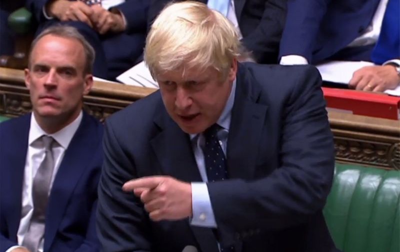 A video grab from footage broadcast by the UK Parliament's Parliamentary Recording Unit (PRU) shows Britain's Prime Minister Boris Johnson responding to his defeat on Standing Order 24, an emergency debate on a no-deal Brexit in the House of Commons in London on September 3, 2019. - Prime Minister Boris Johnson suffered a major parliamentary defeat over his Brexit strategy on Tuesday, which could delay Britain's exit from the European Union next month and force an early election. (Photo by - / PRU / AFP) / RESTRICTED TO EDITORIAL USE - MANDATORY CREDIT " AFP PHOTO / PRU " - NO USE FOR ENTERTAINMENT, SATIRICAL, MARKETING OR ADVERTISING CAMPAIGNS - EDITORS NOTE THE IMAGE HAS BEEN DIGITALLY ALTERED AT SOURCE TO OBSCURE VISIBLE DOCUMENTS