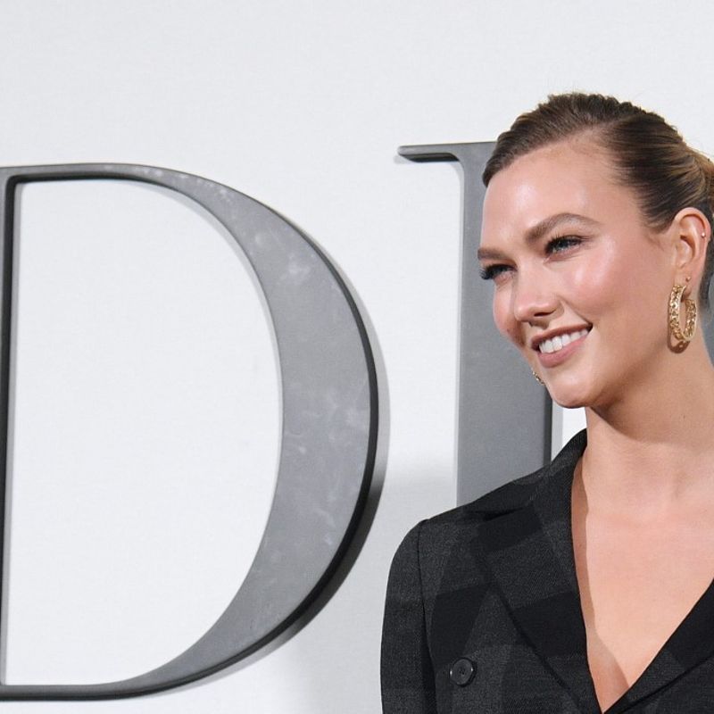 US model Karlie Kloss poses during the photocall prior to the Dior Women's Fall-Winter 2020-2021 Ready-to-Wear collection fashion show in Paris, on February 25, 2020. (Photo by Anne-Christine POUJOULAT / AFP)