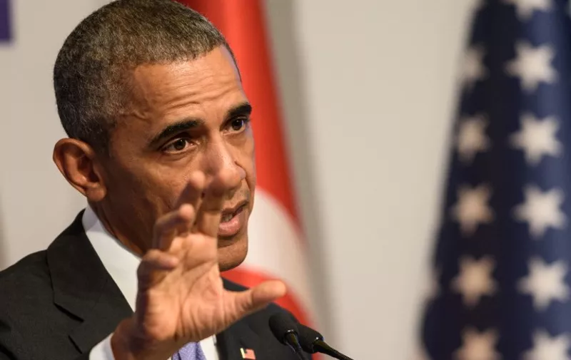 US President Barack Obama gestures during a press conference following the G20 summit in Antalya on November 16, 2015. US President Barack Obama said November 16 the United States had no precise intelligence warning of the Paris bombing and shooting attacks that have been claimed by Islamic State group jihadists. The United States has agreed to speed up its sharing of military intelligence with France to try to avert such assaults, the US leader added in a news conference after a summit in Turkey. AFP PHOTO /OZAN KOSE