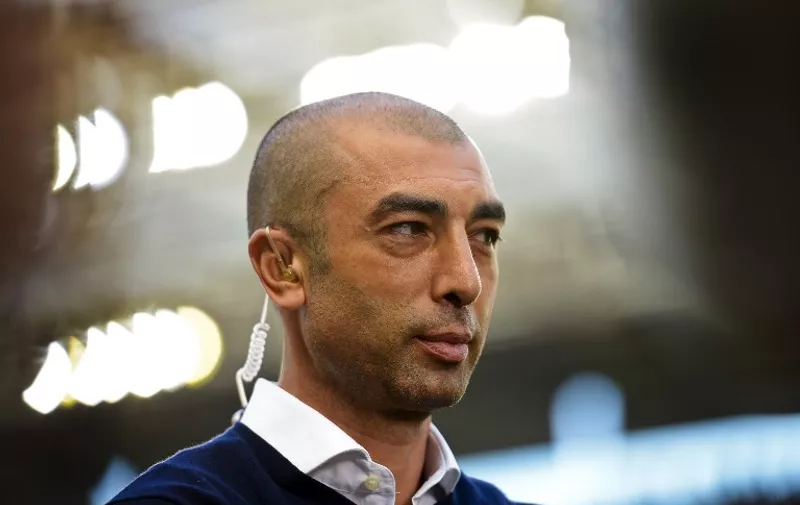 Schalke's head coach Roberto Di Matteo is pictured during the German first division Bundesliga football match of FC Cologne vs FC Schalke 04 in Cologne, western Germany on May 10, 2015.    AFP PHOTO / 
RESTRICTIONS - DFL RULES TO LIMIT THE ONLINE USAGE DURING MATCH TIME TO 15 PICTURES PER MATCH. IMAGE SEQUENCES TO SIMULATE VIDEO IS NOT ALLOWED AT ANY TIME. FOR FURTHER QUERIES PLEASE CONTACT DFL DIRECTLY AT + 49 69 650050.