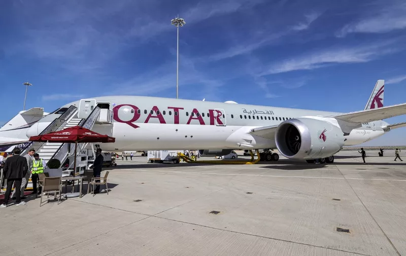 A Qatar Airways Boeing 787-9 jetliner aircraft is pictured on the tarmac during the 2023 Dubai Airshow at Dubai World Central - Al-Maktoum International Airport in Dubai on November 13, 2023. (Photo by Giuseppe CACACE / AFP)