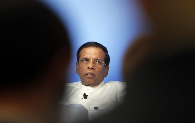 Sri Lankan President Maithripala Sirisena participates in a panel discussion during the Anti-Corruption Summit London 2016, at Lancaster House in central London on May 12, 2016.
British Prime Minister David Cameron kicked off a global anti-corruption summit on Thursday with a plan to stop the flow of dirty money into London property, but faces calls to do more to open up Britain's overseas tax havens. Cameron is pushing for new international commitments on tackling corruption from almost 50 nations and overseas territories attending the summit, including the leaders of Nigeria and Afghanistan, and US Secretary of State John Kerry. / AFP PHOTO / POOL / Frank Augstein