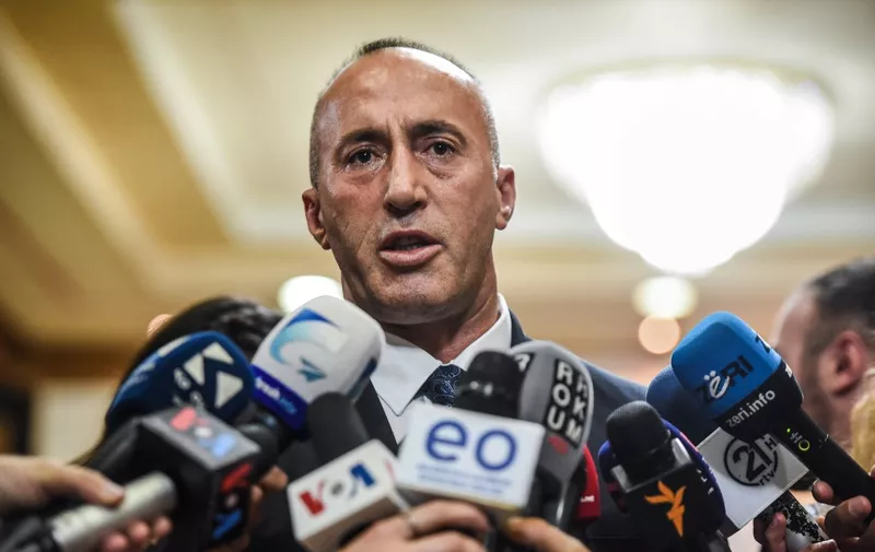 Newly elected Prime Minister of Kosovo Ramush Haradinaj talks to the press after a parliament session in Pristina on September 9, 2017. (Photo by Armend NIMANI / AFP)