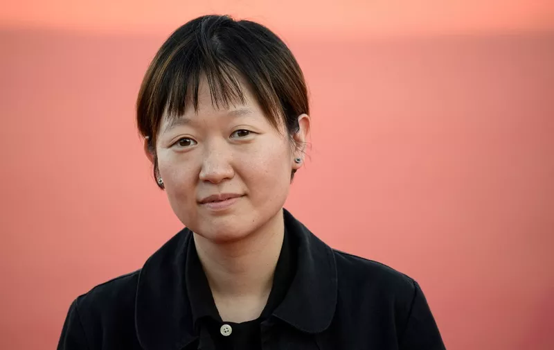 South Korean film director Celine Song arrives to attend the 49th edition of the American film festival in Deauville, western France on September 2, 2023. (Photo by LOIC VENANCE / AFP)