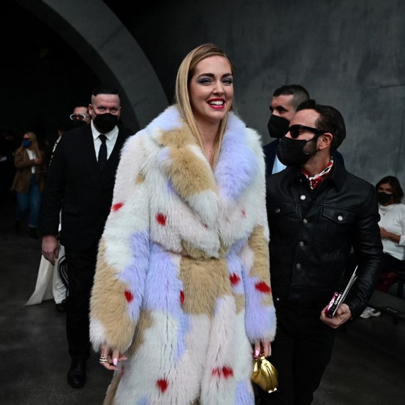 Italian blogger Chiara Ferragni poses prior to the Fendi catwalk show for the Women Fall/Winter 2022/2023 collection on the second day of the Milan Fashion Week in Milan on February 23, 2022. (Photo by MIGUEL MEDINA / AFP)