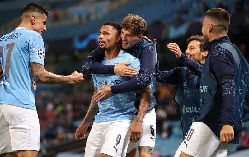 MANCHESTER, ENGLAND - AUGUST 07: Gabriel Jesus of Manchester City celebrates with teammates after scoring his team's second goal during the UEFA Champions League round of 16 second leg match between Manchester City and Real Madrid at Etihad Stadium on August 07, 2020 in Manchester, England. (Photo by Nick Potts/Pool via Getty Images)